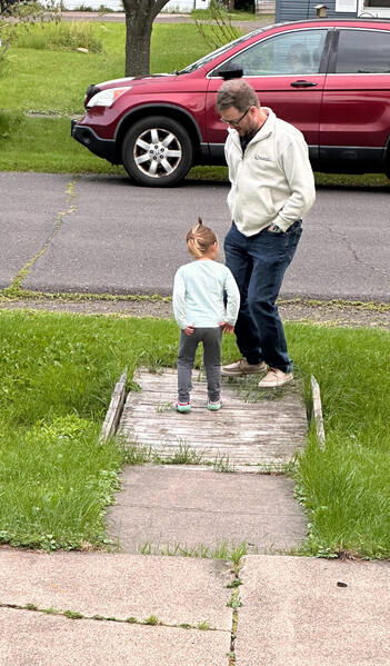 Ev and Erik jumping for the ice cream truck